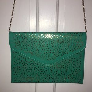 Green laser cut envelope handbag